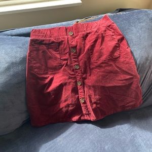 Torrid button down cord skirt burgundy with pockets.